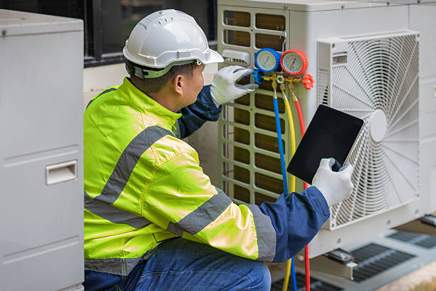 Professional Heat Pump Repair technician working in Hemphill, TX